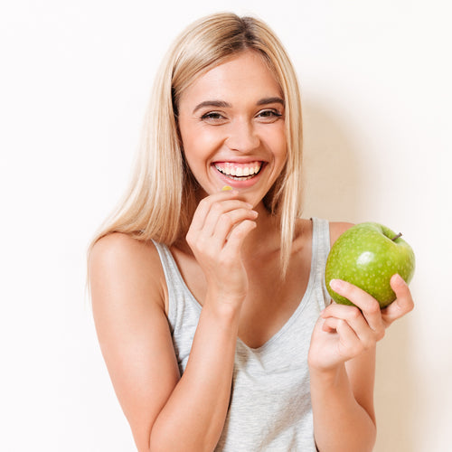 Woman with apple cider vinegar gummies