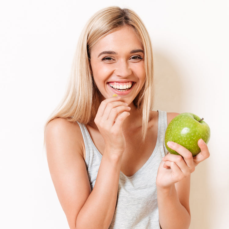 Woman with apple cider vinegar gummies